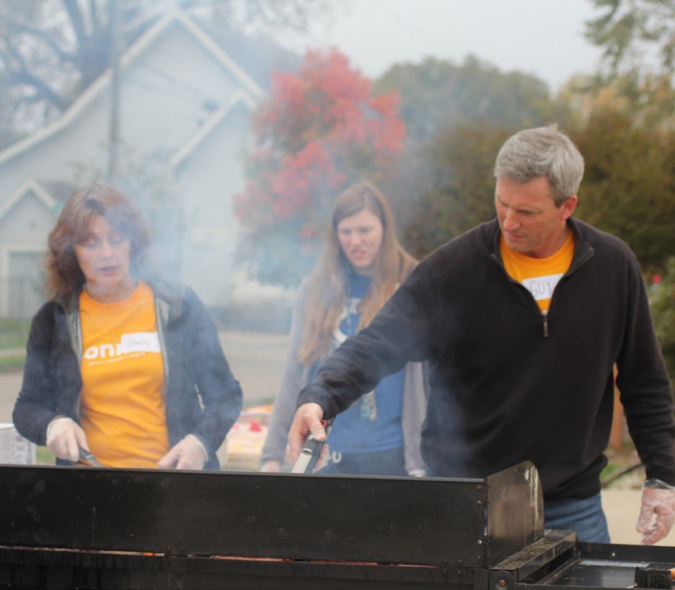 IT Director, Guy Vreeman mans the grill during iConnect! day of service.